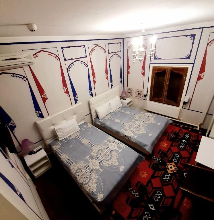 Двухместный (Стандартный двухместный номер с 2 отдельными кроватями и ванной) отеля Chor Minor, Бухара