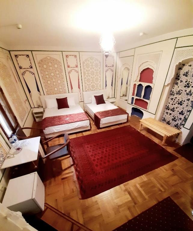 Двухместный (Двухместный номер «Комфорт» с 2 отдельными кроватями) отеля Chor Minor, Бухара