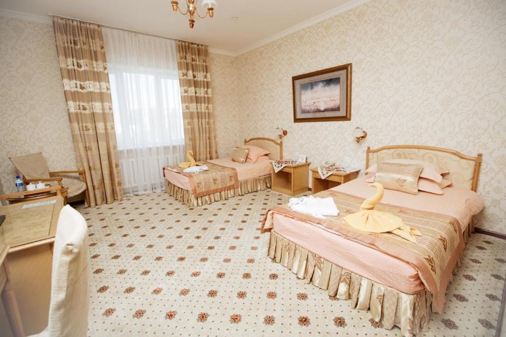 Двухместный (Стандартный двухместный номер с 2 отдельными кроватями) отеля Asia Khiva, Хива