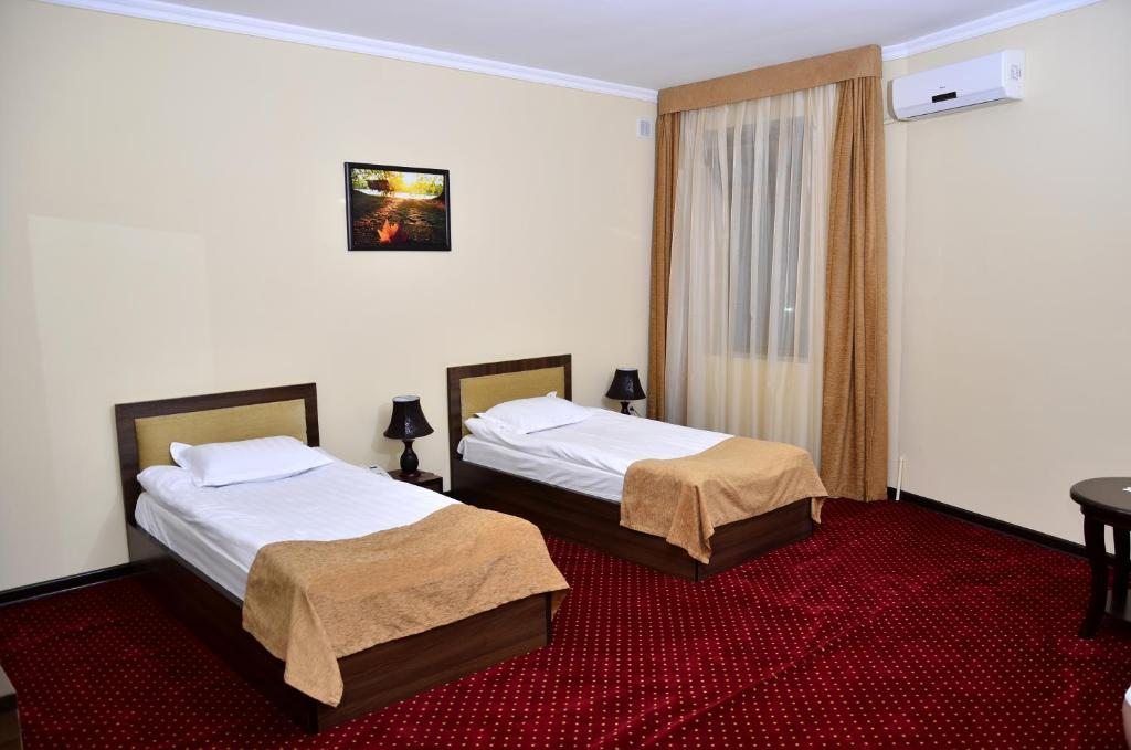Двухместный (Стандартный двухместный номер с 2 отдельными кроватями) отеля Диора, Самарканд