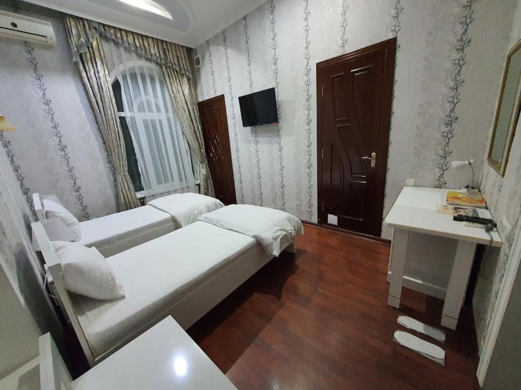 Двухместный (Стандартный двухместный номер с 1 кроватью или 2 отдельными кроватями) отеля Ideal, Самарканд