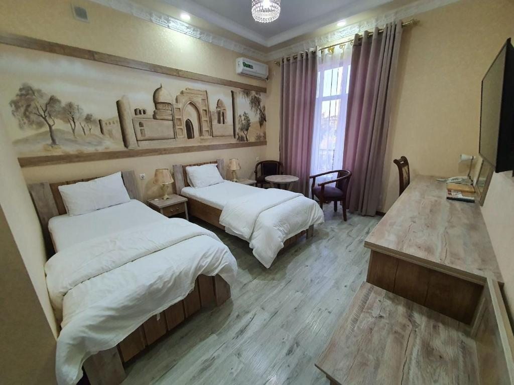 Двухместный (Улучшенный двухместный номер с 2 отдельными кроватями и видом на сад) отеля Ideal, Самарканд