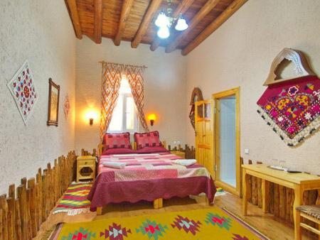 Двухместный (Двухместный номер с 1 кроватью или 2 отдельными кроватями) отеля Qosha Darvoza, Хива