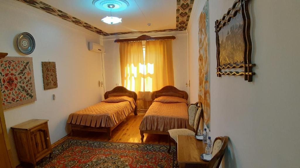 Двухместный (Двухместный номер с 2 отдельными кроватями и ванной) отеля Shaherezada Khiva, Хива