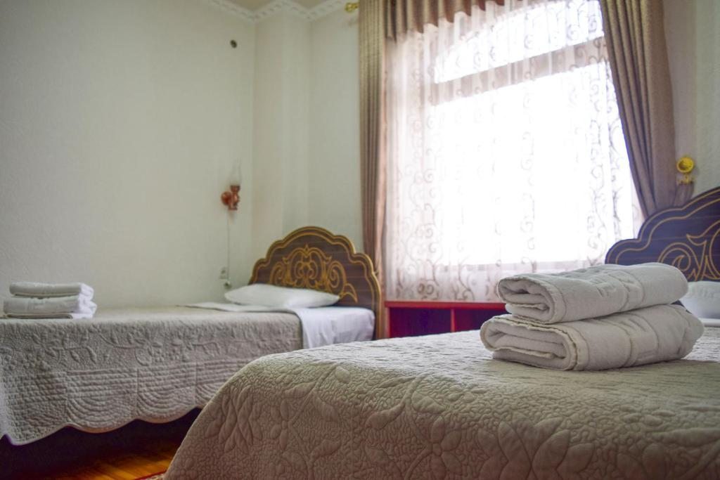 Двухместный (Стандартный двухместный номер с 2 отдельными кроватями) отеля Зилол Бахт, Самарканд