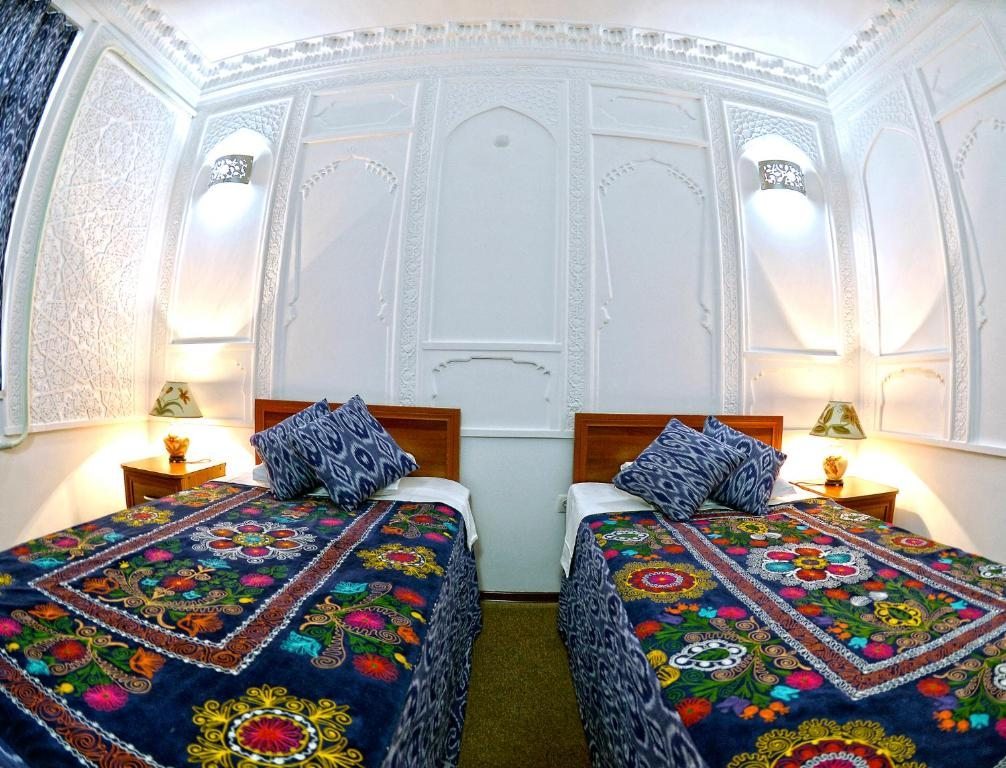 Двухместный (Стандартный двухместный номер с 1 кроватью или 2 отдельными кроватями) отеля Minzifa Inn, Бухара