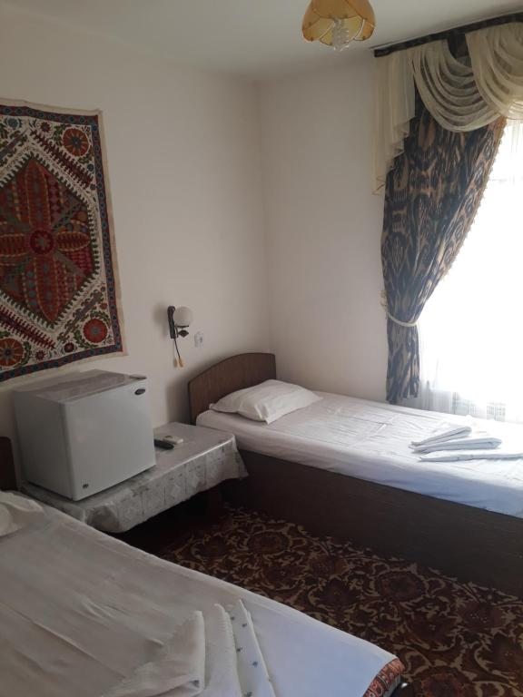 Двухместный (Двухместный номер с 2 отдельными кроватями) гостевого дома Nazira & Azizbek, Бухара