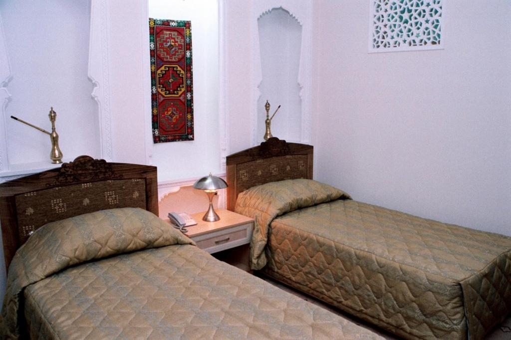 Двухместный (Стандартный двухместный номер с 2 отдельными кроватями) отеля Omar Khayyam, Бухара