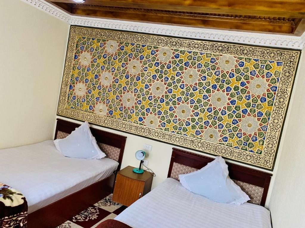 Двухместный (Двухместный номер с 2 отдельными кроватями) отеля Сухроб Барзу, Бухара