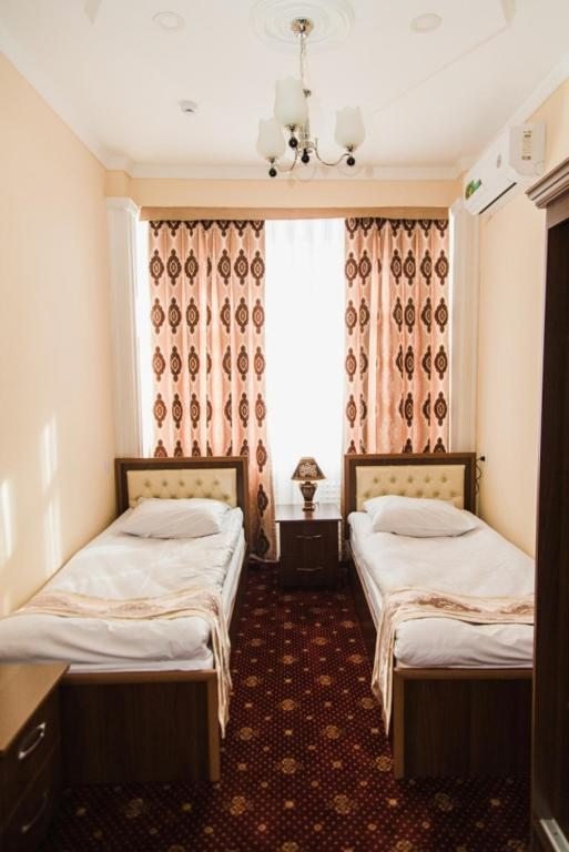 Двухместный (Двухместный номер с 2 отдельными кроватями и собственной ванной комнатой за пределами номера) отеля АРТ, Ташкент
