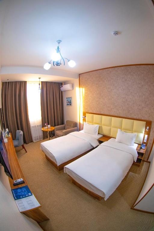 Двухместный (Двухместный номер с 2 отдельными кроватями) отеля Sayyoh, Ташкент