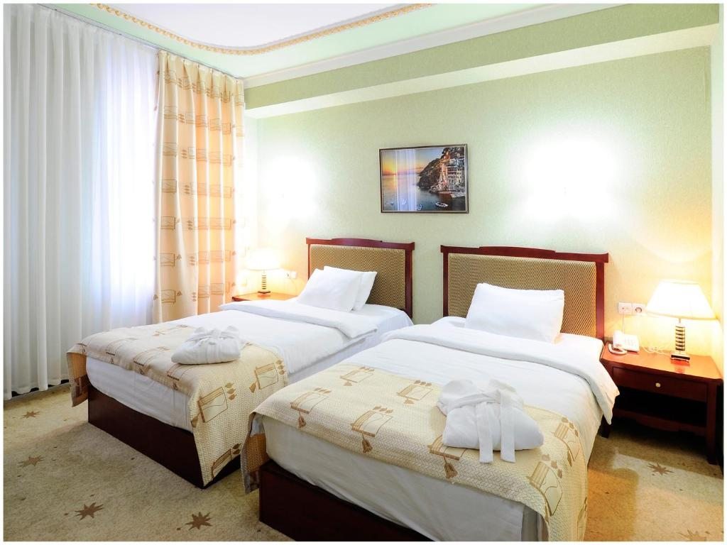 Двухместный (Стандартный двухместный номер с 1 кроватью или 2 отдельными кроватями) отеля Золотая Долина, Ташкент