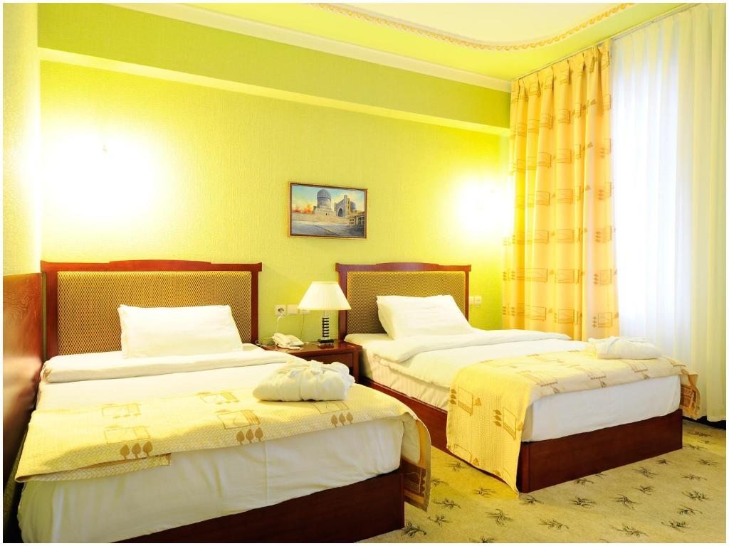 Двухместный (Двухместный номер Делюкс с 2 отдельными кроватями) отеля Золотая Долина, Ташкент