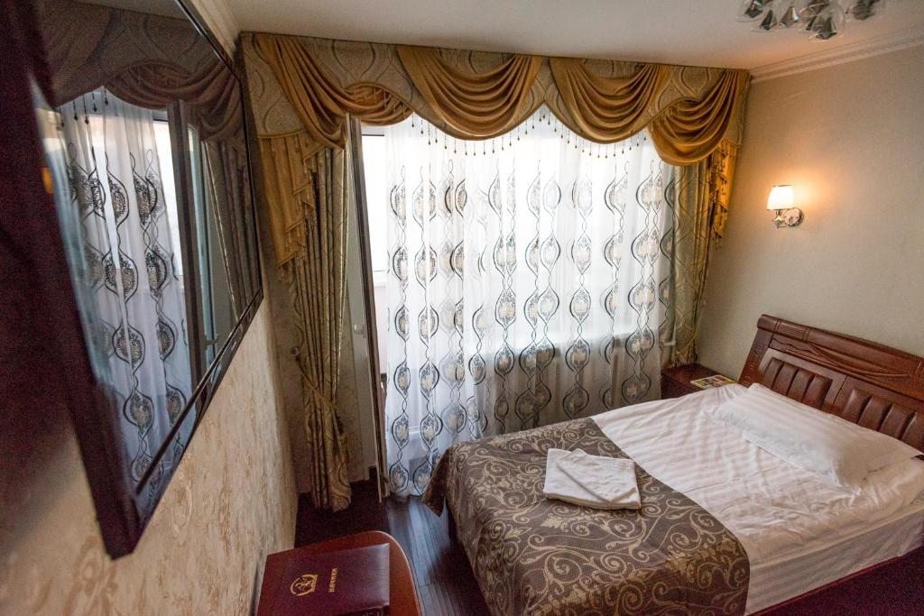 Двухместный (Двухместный номер с 2 отдельными кроватями и балконом) отеля Начики