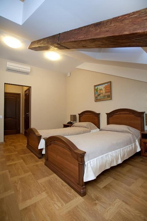 Двухместный (Стандартный двухместный номер с 2 отдельными кроватями) гостевого дома Castle Hotel, Санкт-Петербург