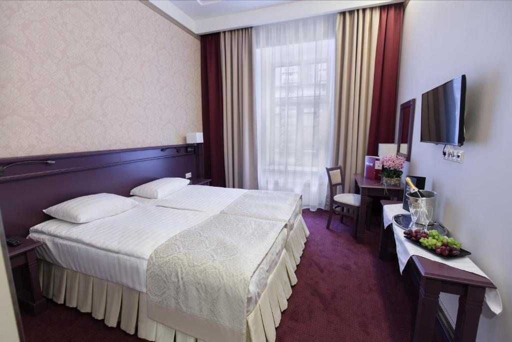 Стандартный двухместный номер с 2 кроватями в отеле «Бридж» 4*, Санкт-Петербург. Отель Бридж