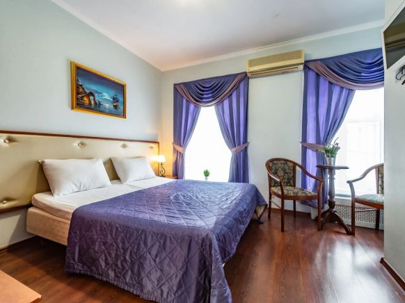 Фотография номера гостиницы Времена Года