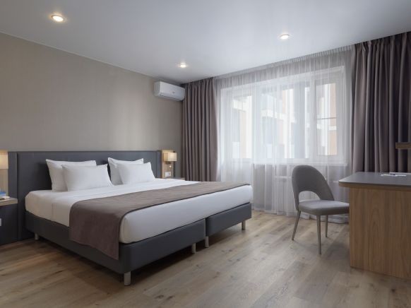 Фотография номера апарт отеля Волга