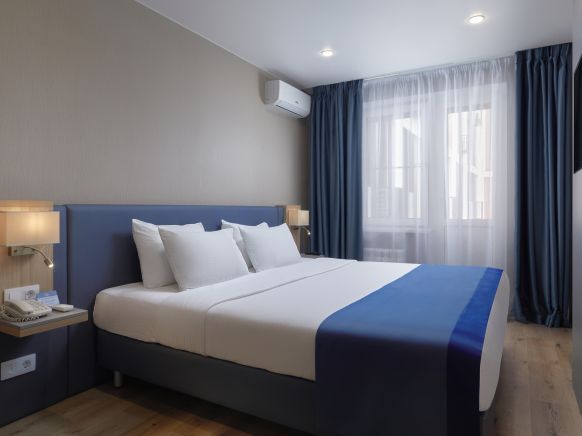 Фотография номера апарт отеля Волга