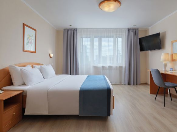 Фотография номера апарт отеля Волга