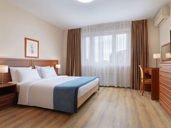 Фотография номера апарт отеля Волга