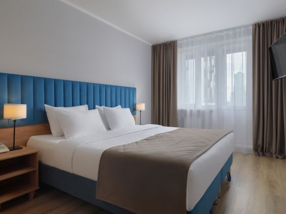 Фотография номера апарт отеля Волга