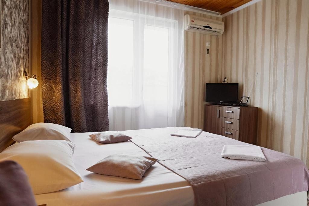 Двухместный (Стандартный двухместный номер с 1 кроватью или 2 отдельными кроватями) гостиницы Золотой Берег, Архипо-Осиповка