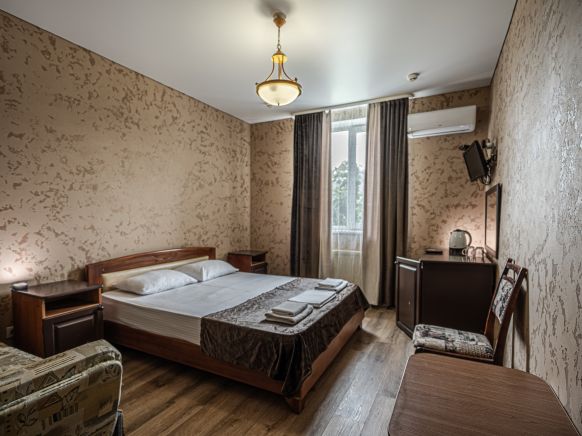 Фотография номера гостевого дома Изумруд