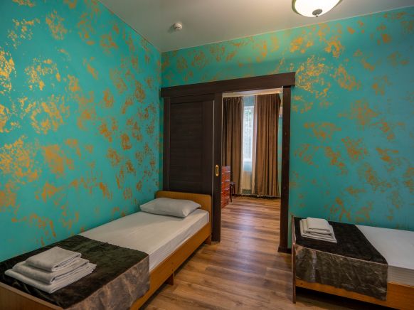 Фотография номера гостевого дома Изумруд