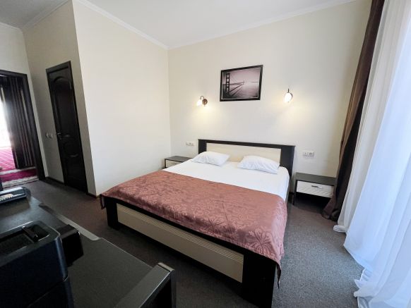 Фотография номера гостиницы Золотой берег