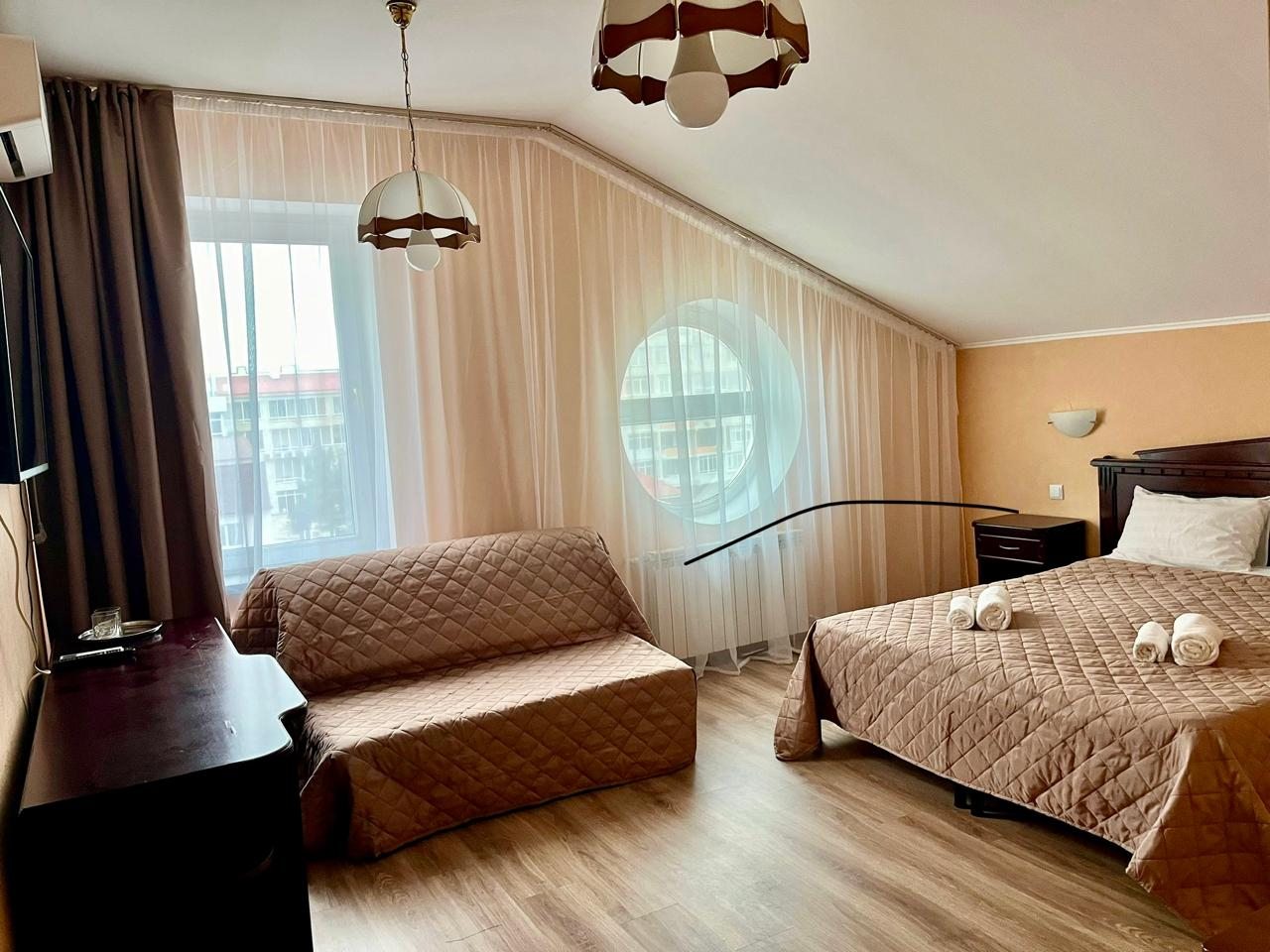 Номер находится на мансардном 5 этаже