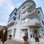 Наземная парковка, Отель Каравелла