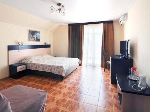 Фотография номера гостиницы Каро