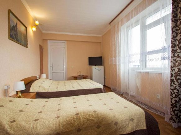 Фотография номера гостиницы Каро