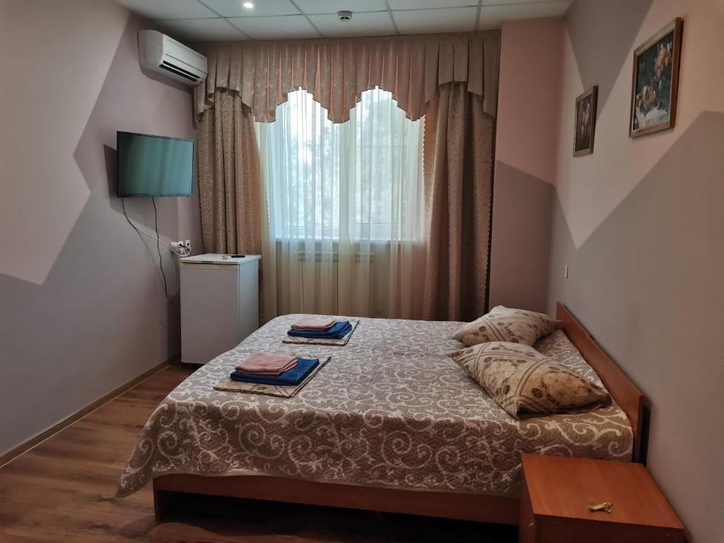 Двухместный (Стандартный двухместный номер с 2 отдельными кроватями) мини-отеля Континент На Крылова, Анапа