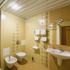 Ванная комната в номере отеля Магнолия Отель, Сочи