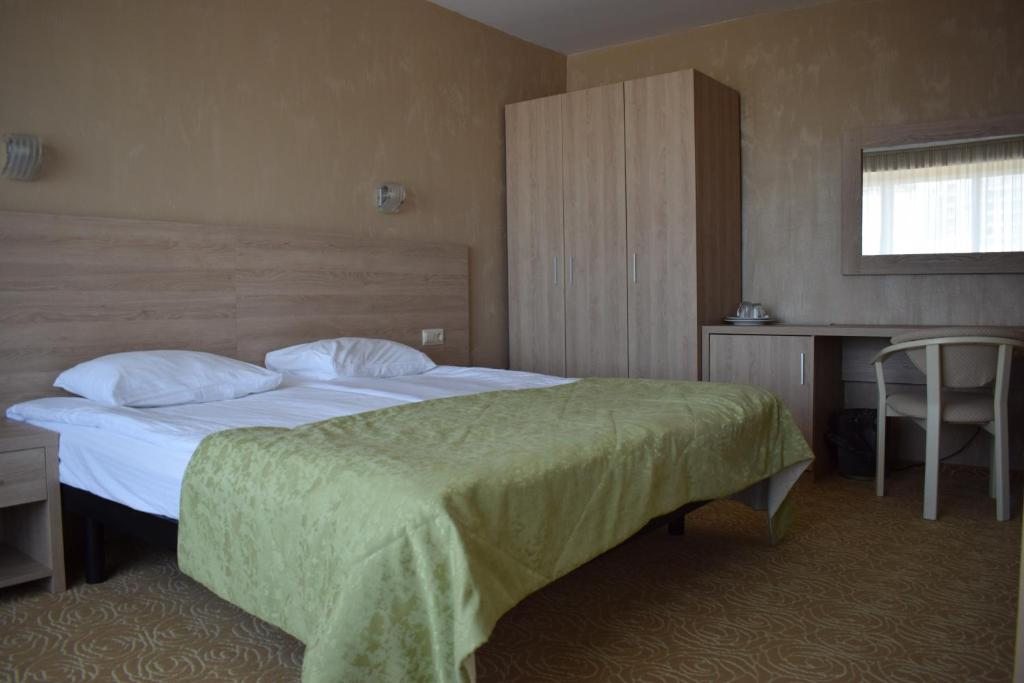 Двухместный (Улучшенный двухместный номер с 1 кроватью и диваном-кроватью) отеля Магнолия, Сочи