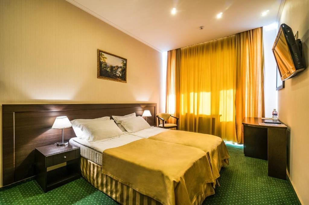 Двухместный (Стандартный двухместный номер с 1 кроватью или 2 отдельными кроватями) отеля Дельмонт, Сукко