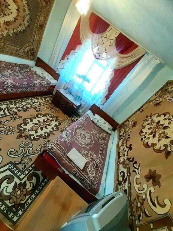 Двухместный (Двухместный номер с 2 отдельными кроватями и общей ванной комнатой) гостевого дома Kishimzhan, Талас
