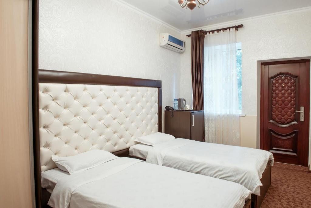 Двухместный (Стандартный двухместный номер с 1 кроватью или 2 отдельными кроватями) отеля Grand, Бишкек