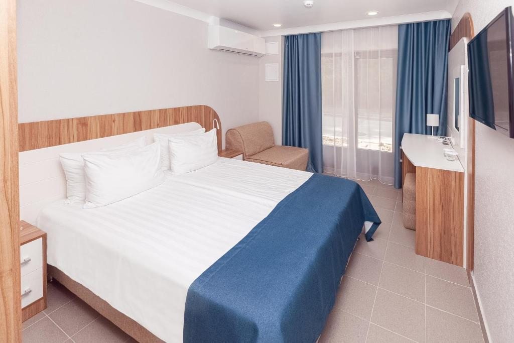 Двухместный (Небольшой двухместный номер с 1 кроватью или 2 отдельными кроватями) отеля Alean Family Resort & SPA Sputnik, Сочи