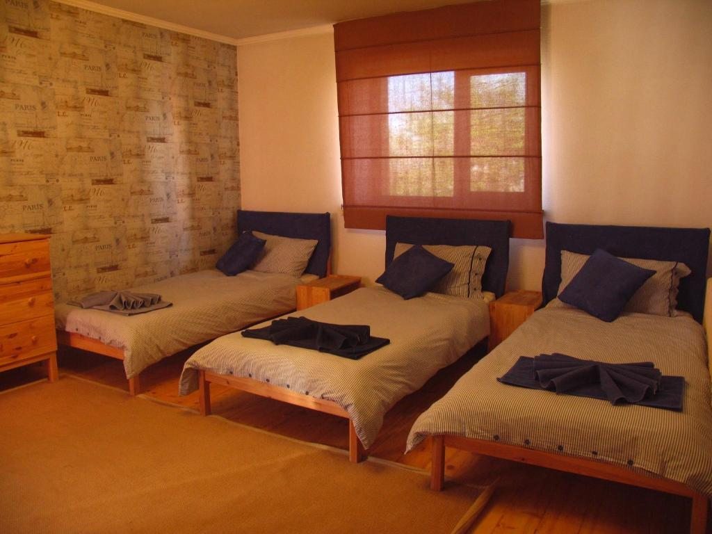 Двухместный (Улучшенный двухместный номер с 1 кроватью или 2 отдельными кроватями) отеля Memo's Guest House, Каракол (Иссык-Кульская область)