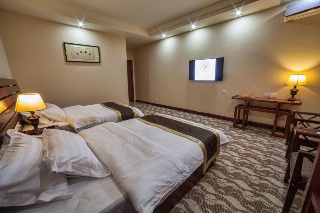 Двухместный (Двухместный номер с 2 отдельными кроватями) отеля Шанхай Сити, Ош