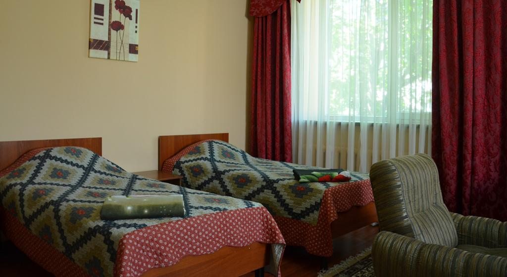 Двухместный (Двухместный номер Делюкс с 2 отдельными кроватями) отеля Флагман, Бишкек