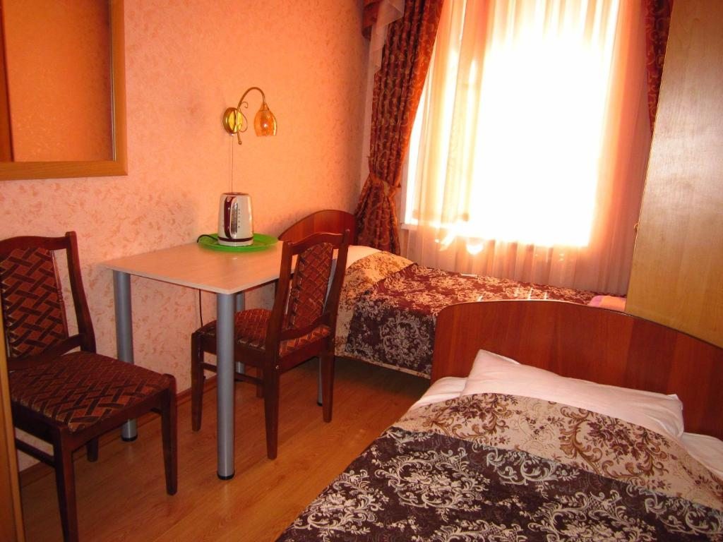 Двухместный (Двухместный номер с 2 отдельными кроватями и общей ванной комнатой) семейного отеля АБСОЛЮТ, Санкт-Петербург