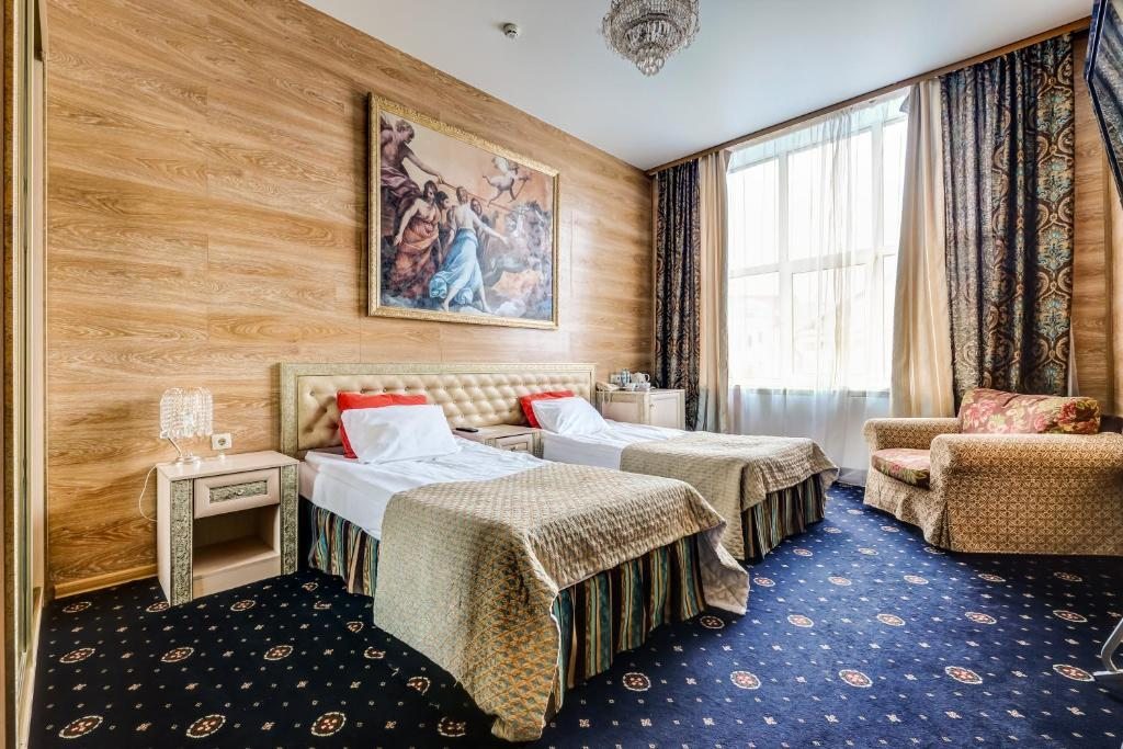 Двухместный (Улучшенный двухместный номер с 2 отдельными кроватями) отеля AZIMUT Отель Дербеневская Москва