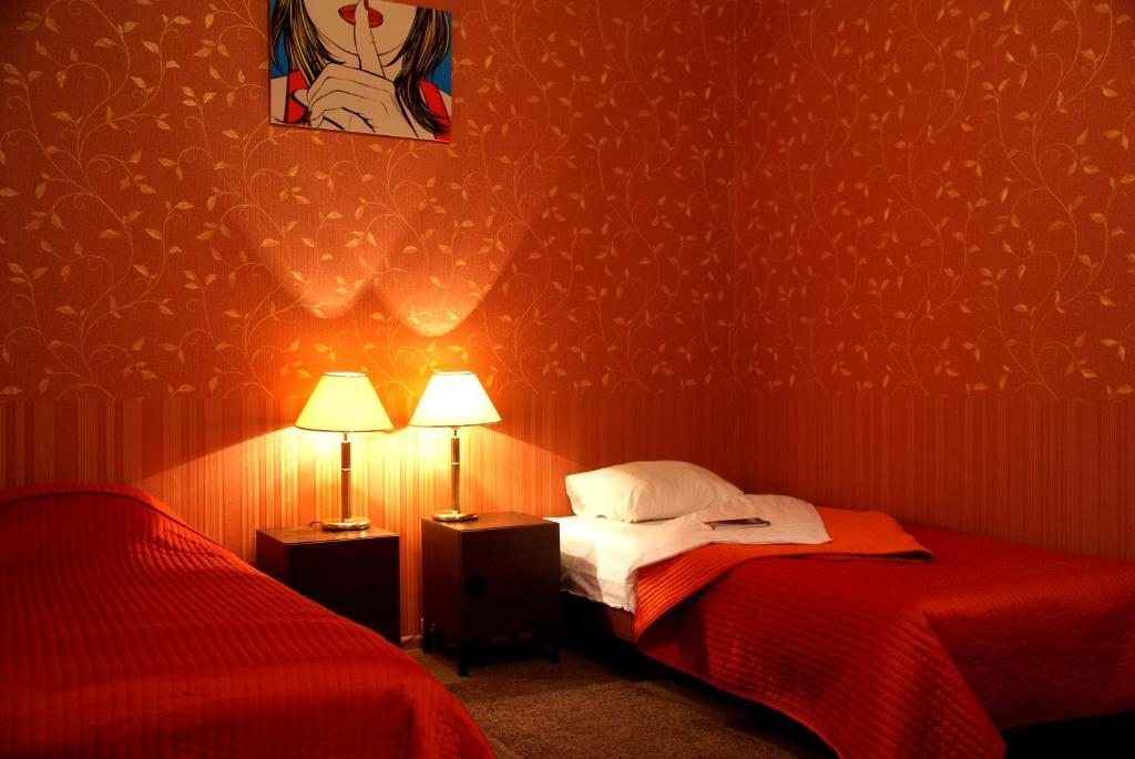 Двухместный (Стандартный двухместный номер с 2 отдельными кроватями) отеля Сверчков 8, Москва