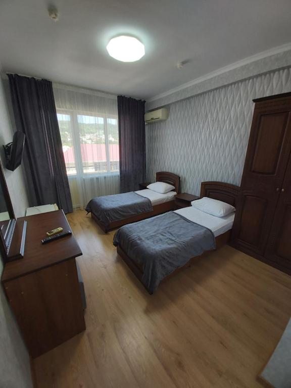 Двухместный (Стандартный двухместный номер с 1 кроватью или 2 отдельными кроватями) гостевого дома Альмира, Лоо