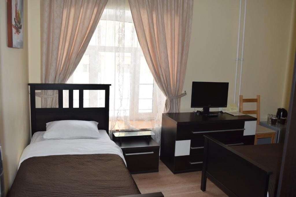 Двухместный (Двухместный номер с 2 отдельными кроватями) отеля Дом на Маяковке, Москва