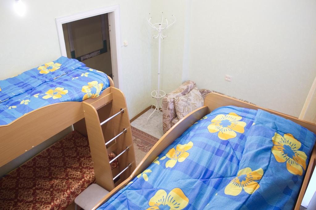 Номер (Спальное место на двухъярусной кровати в общем номере для мужчин и женщин) хостела Кунгур